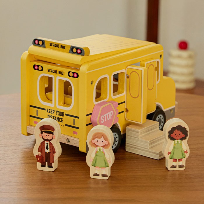 Care instructions and wood characteristics showing natural grain variations on FSC-certified wooden toy