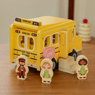 Care instructions and wood characteristics showing natural grain variations on FSC-certified wooden toy