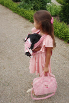 Sweet gingham baby doll carrier with adjustable straps perfect for hands-free nurturing play