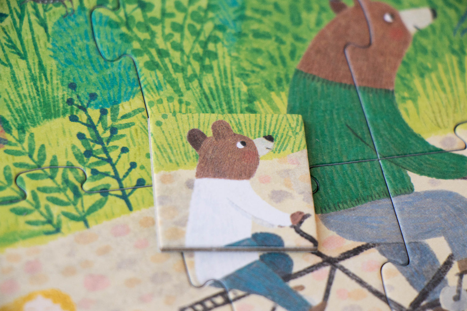 Jigsaw puzzle with animal characters in a forest setting