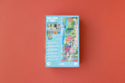 Jigsaw puzzle box with colorful images on a red background