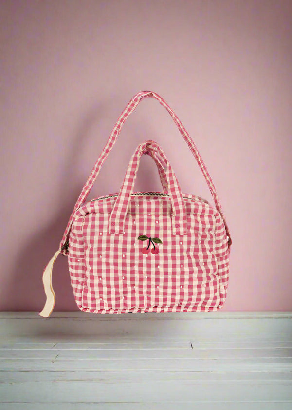 OEKO-TEX cotton doll diaper bag featuring classic pink and white checkered design with exterior pocket