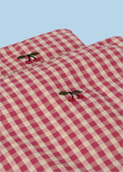 Premium cotton gingham doll bedding in pink and white checkered pattern with button-tufted details