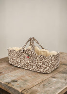 Playroom Collective Konges Sloejd leopard print doll bassinet with scalloped cream lining and embroidered cherry detail