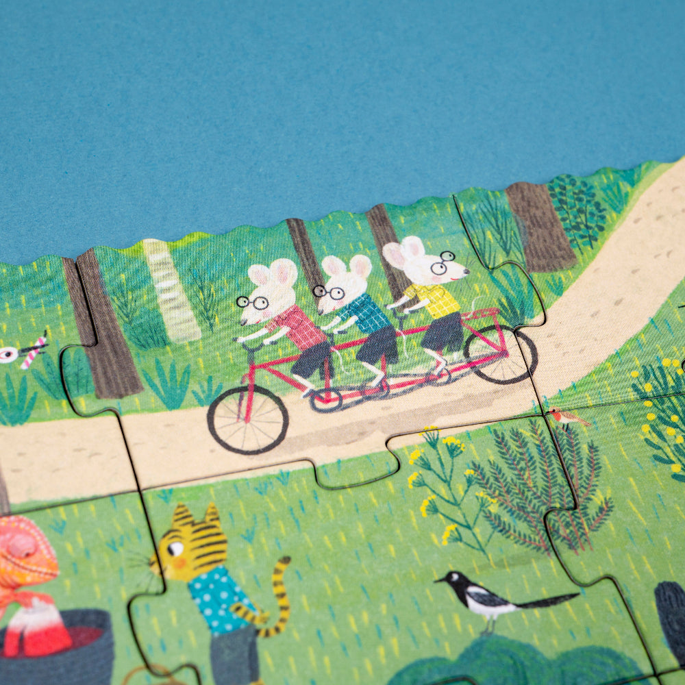 Children's puzzle with cartoon characters riding a tandem bicycle on a blue sky background