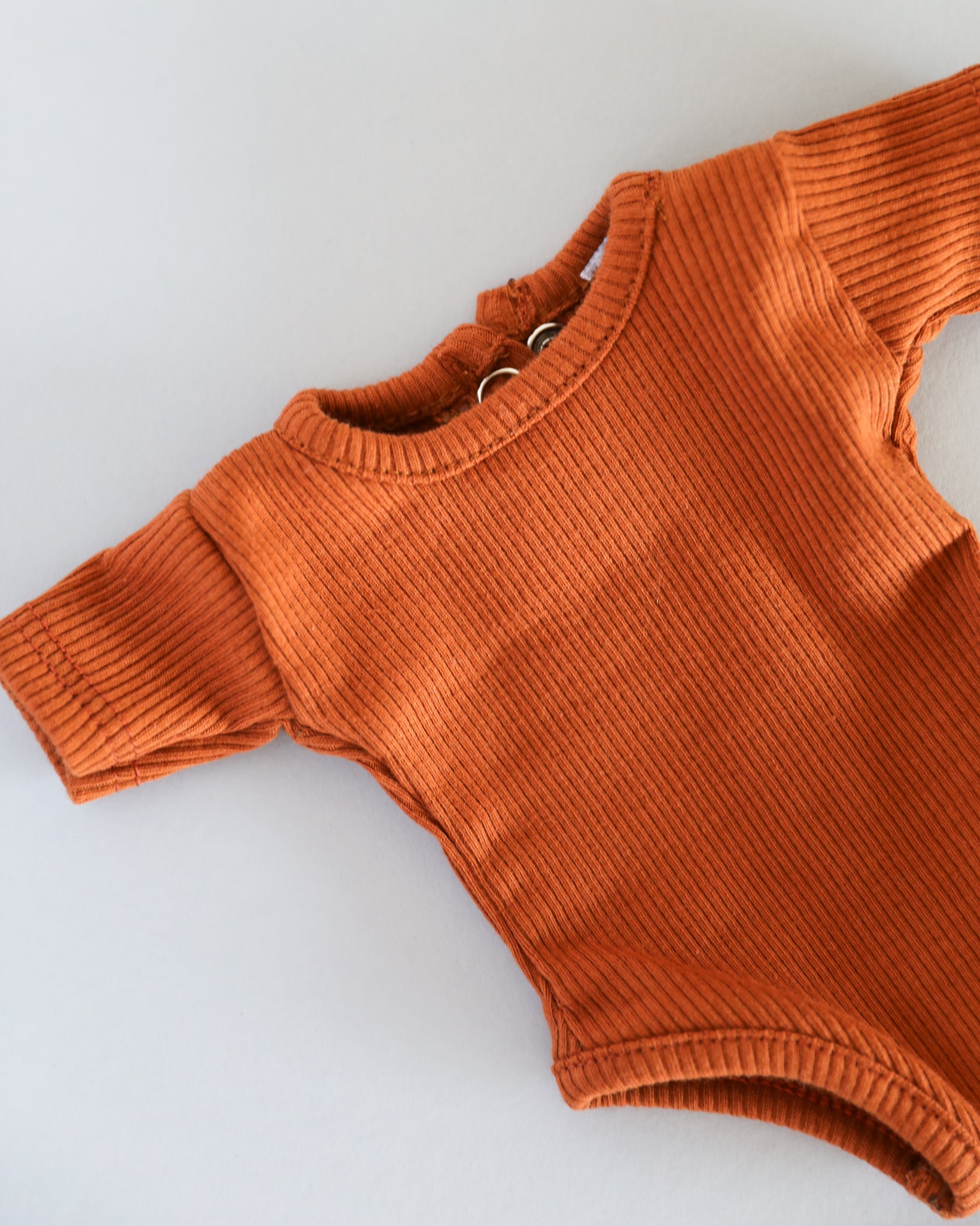 Minikane Doll Clothes | Short Sleeved Baby Doll Bodysuit (Dark Brown)