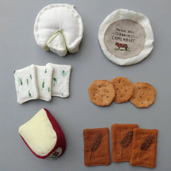 Gourmet play food charcuterie collection featuring hand-embroidered herb cheese and silk screen printed crackers