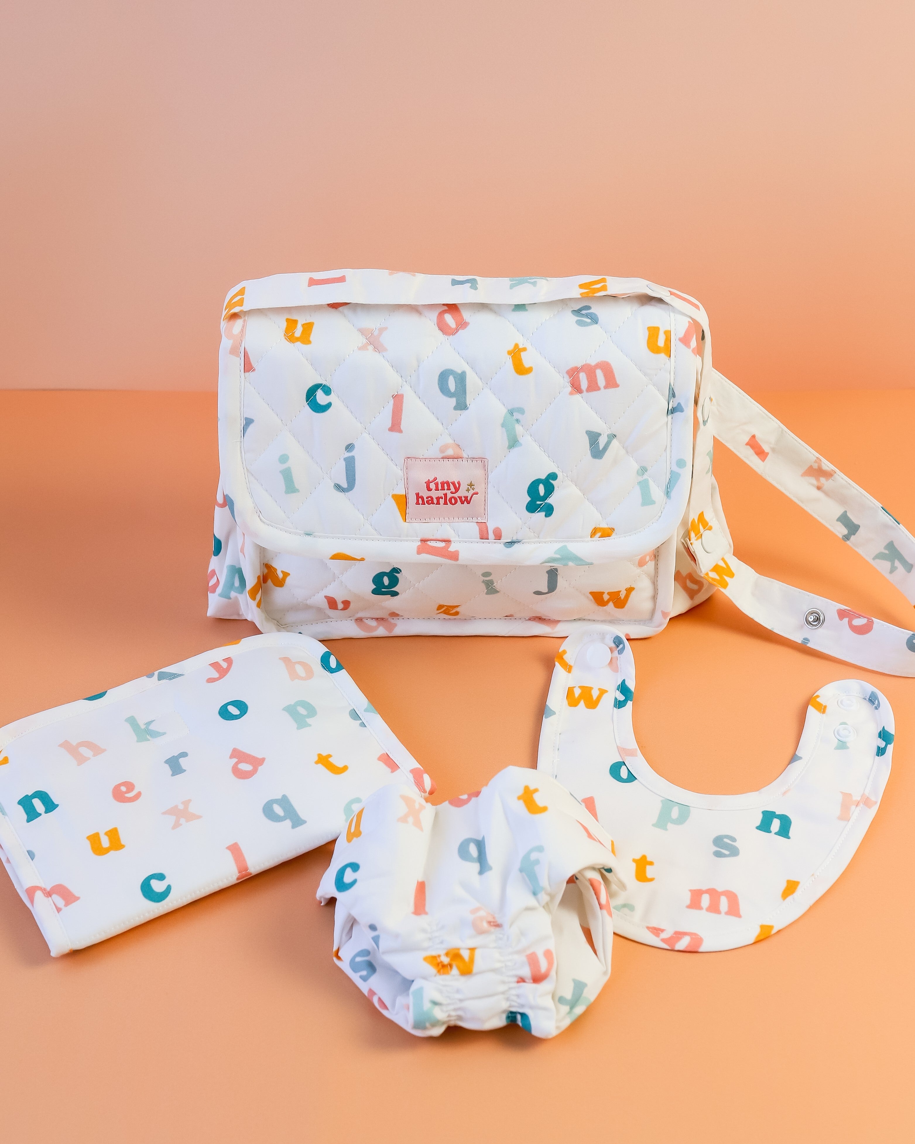 Tiny Harlow | Convertible Doll Diaper Bag Play Set - Alphabet Soup