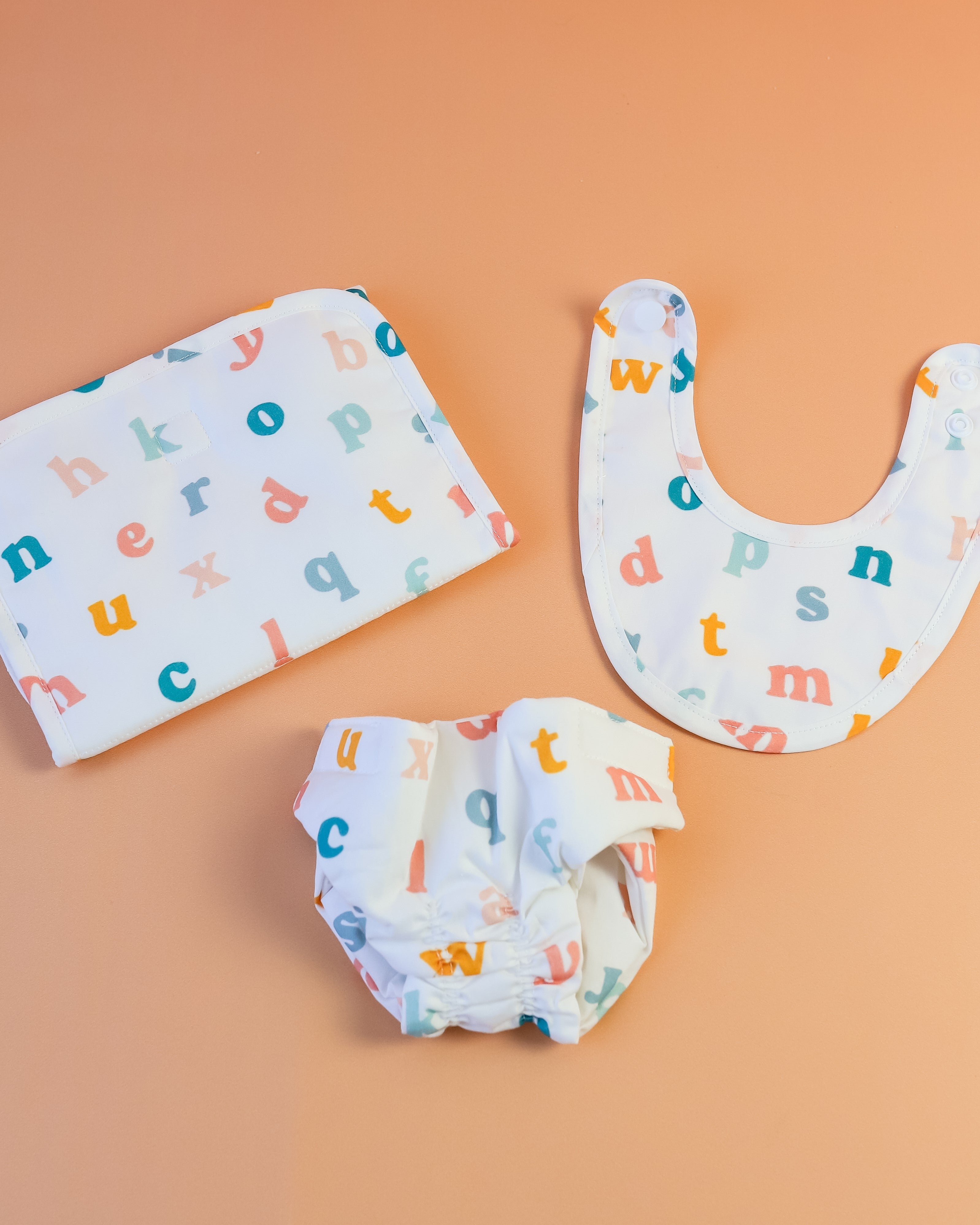 Tiny Harlow | Convertible Doll Diaper Bag Play Set - Alphabet Soup