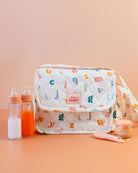 Tiny Harlow | Convertible Doll Diaper Bag Play Set - Alphabet Soup